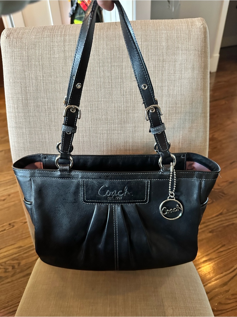 Coach Black Leather Shoulder Bag with Silver Charm
